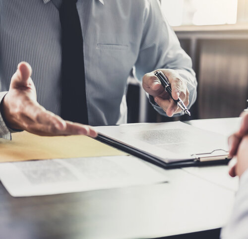 Client meeting with business succession attorney