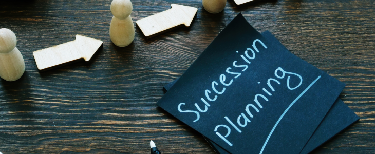 Succession planning written on a note