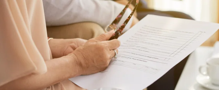 Elder woman completing elder planning documents