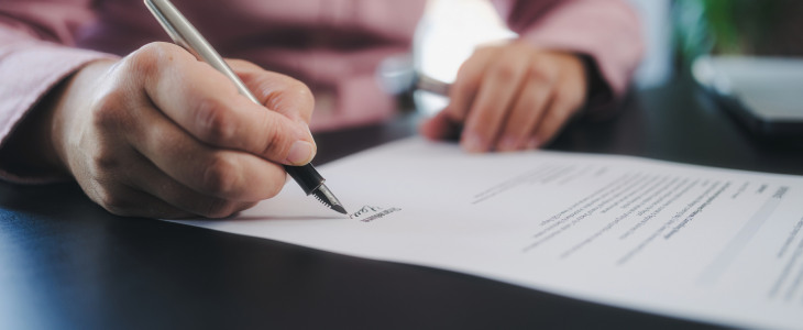 Attorney working on a living will for his client